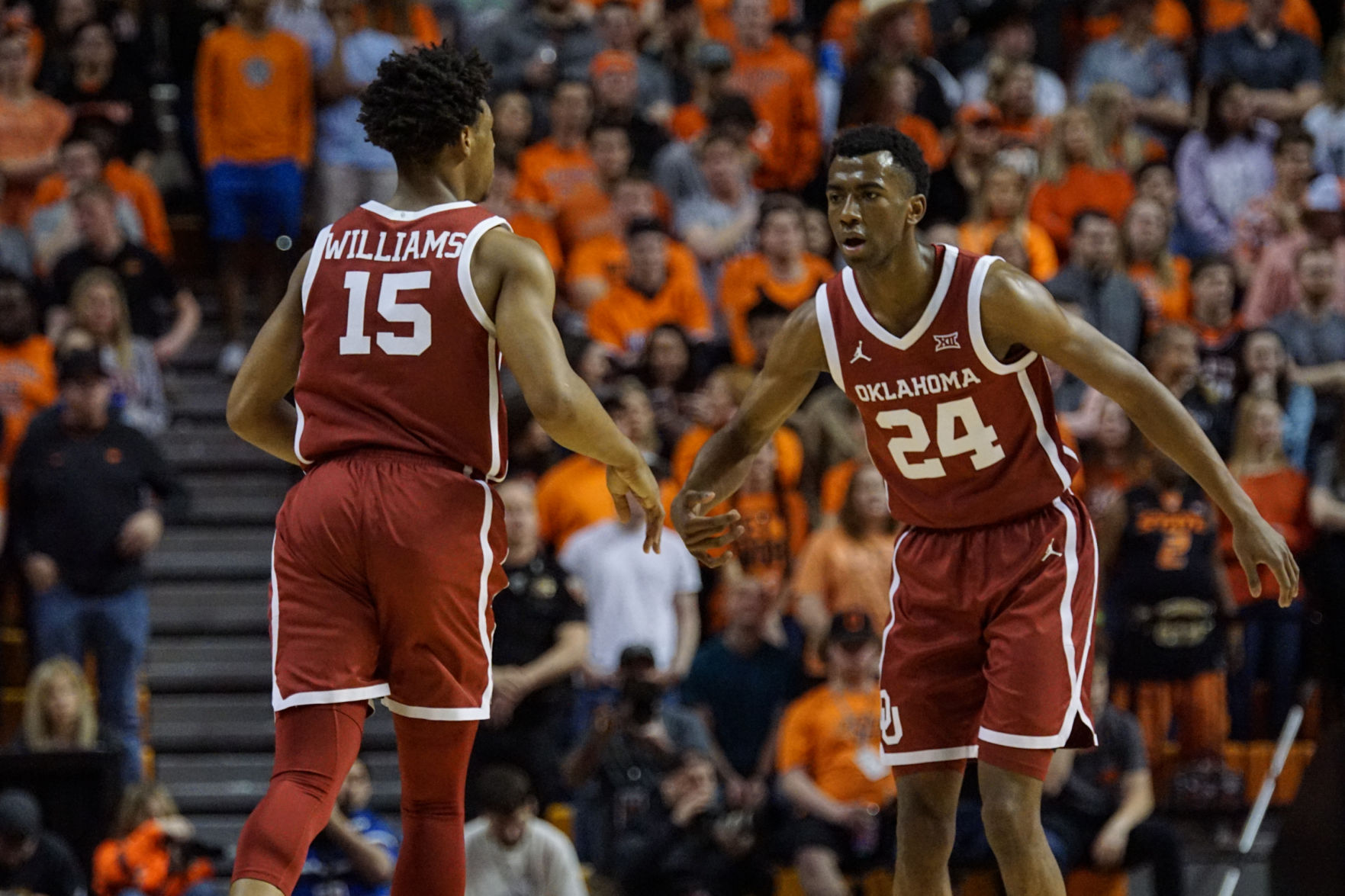Alondes Williams and Jamal Bieniemy high five